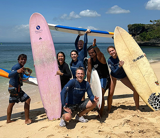 Guests enjoying learning to surf in Bali when staying at S Resorts Hidden Valley